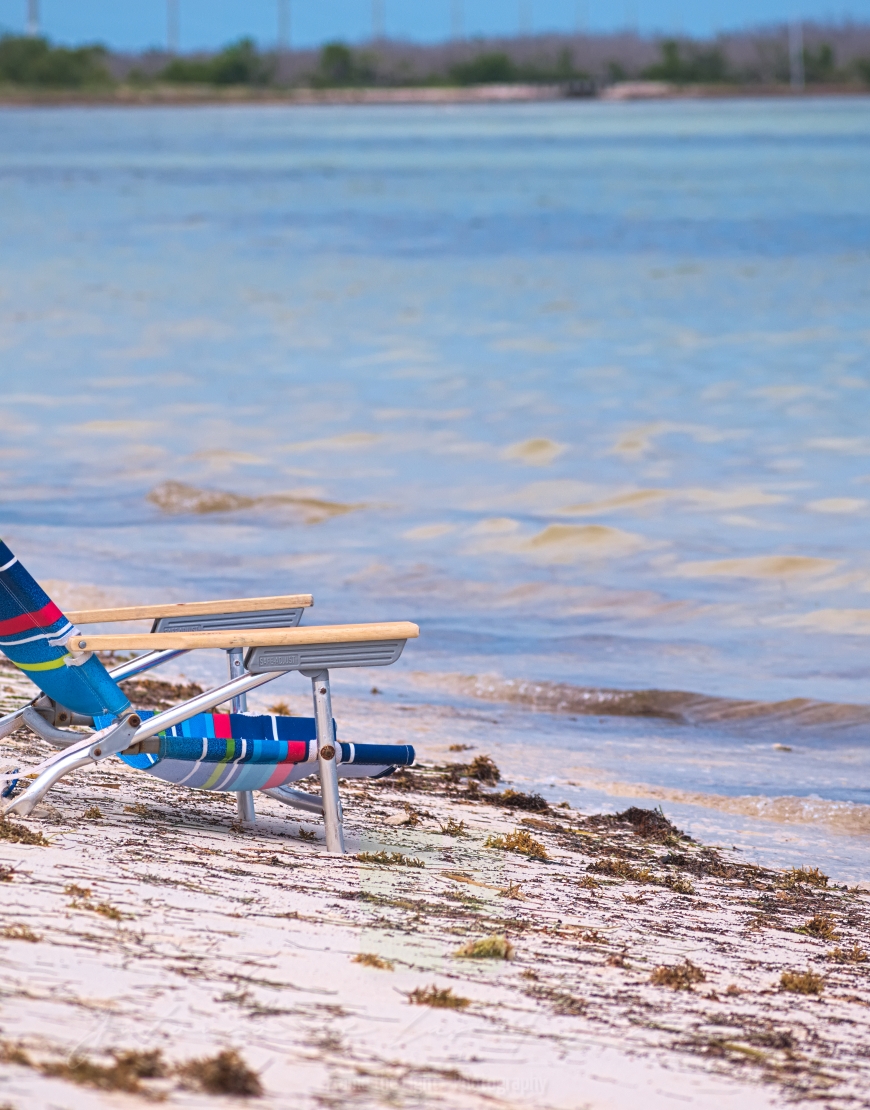 Beach armchair on the shore