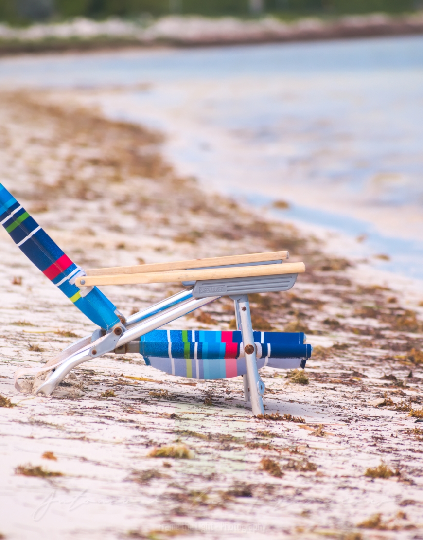 Beach armchair on the shore