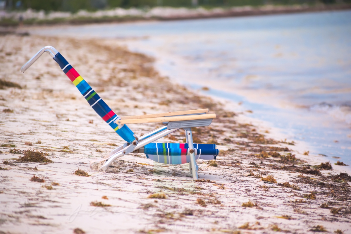 Beach armchair on the shore